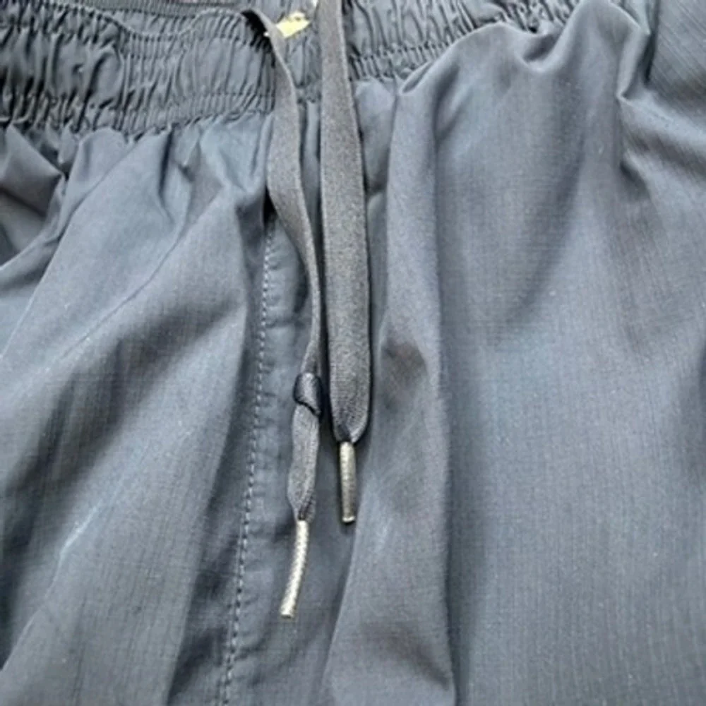 Nike Loose Fit Track Pants Mens Navy Blue White Side Stripe Mesh Lined Athletic